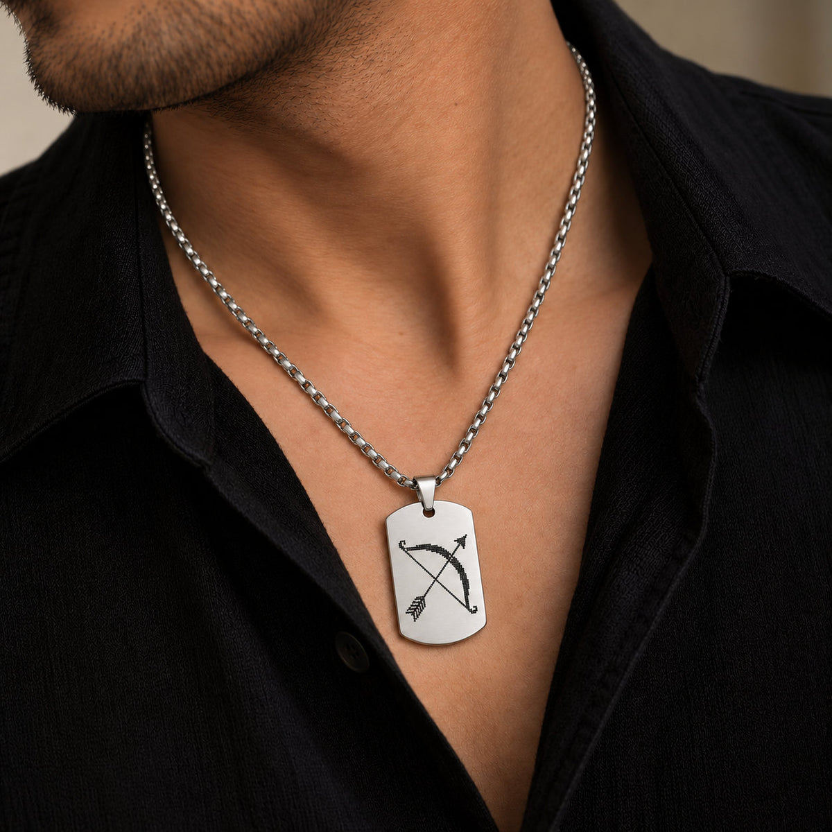 Man wearing silver stainless steel Shri Ram dhanush tag pendant on silver chain