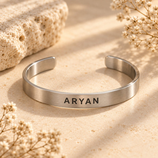Personalized name cuff bracelet in brushed silver stainless steel with engraved name