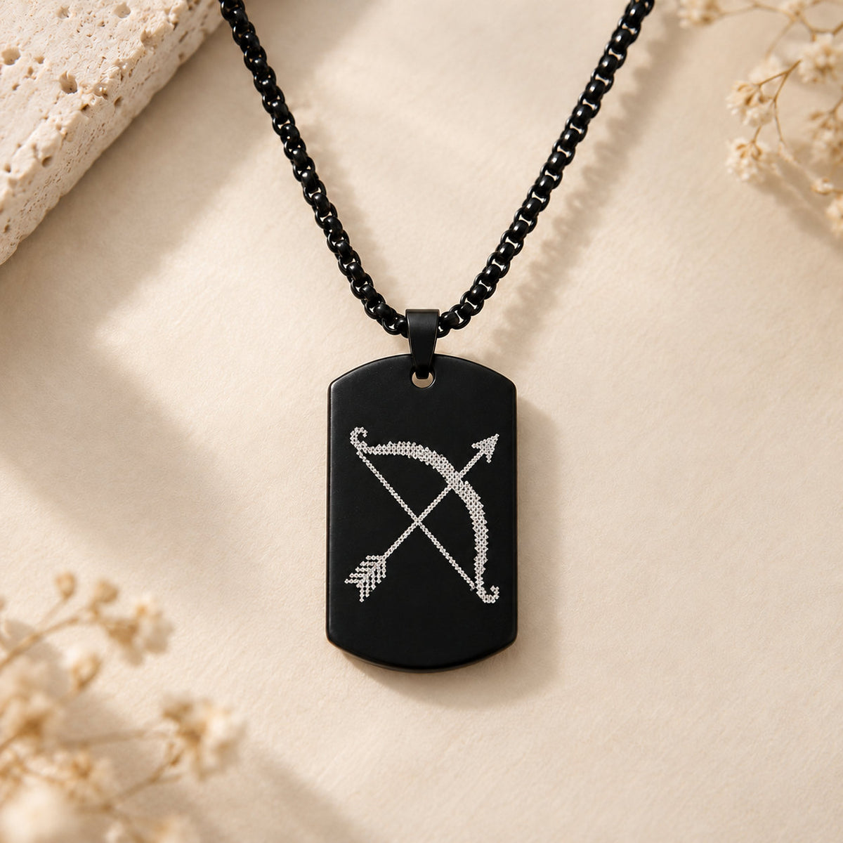 Shri Ram Dhanush Tag Pendant in matte black stainless steel with micro-engraved bow and arrow
