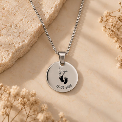 Little Footprints baby name pendant in silver with engraved name, baby feet and birth date