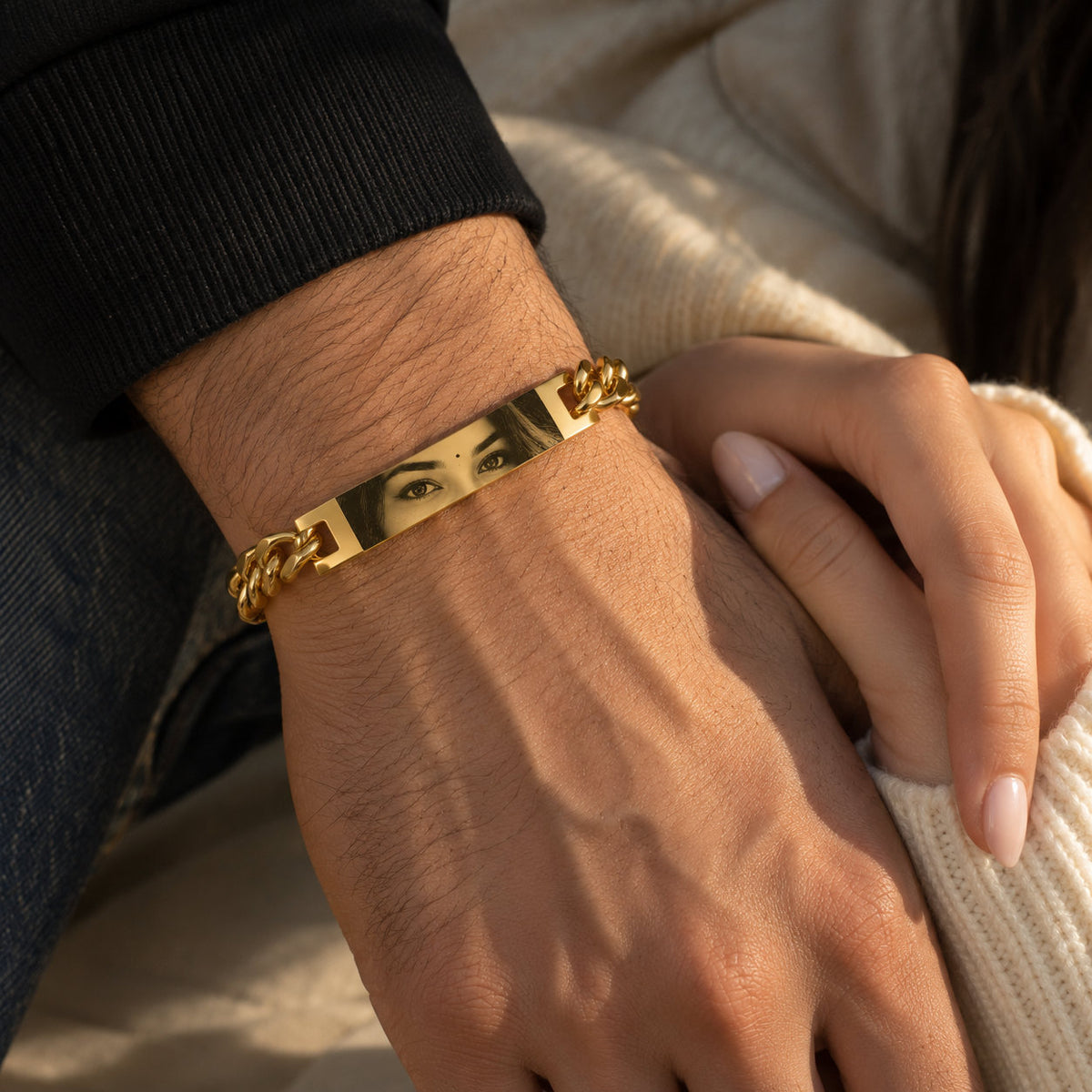Gold personalized eye bracelet worn by a man, couple gift