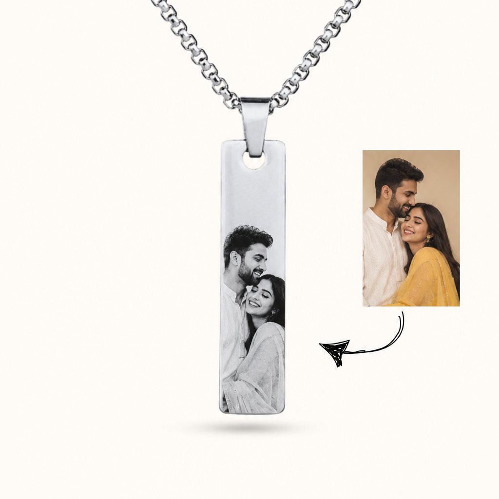 Silver couple photo bar pendant showing a photo turned into engraving