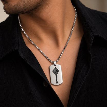 Man wearing silver stainless steel Hanuman gada tag pendant on silver chain